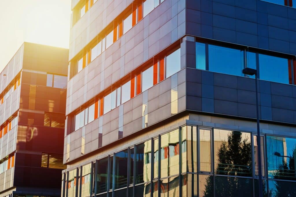 Modern office building with green trees